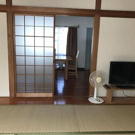 Golden Mile Apartment Amami Luaran gambar