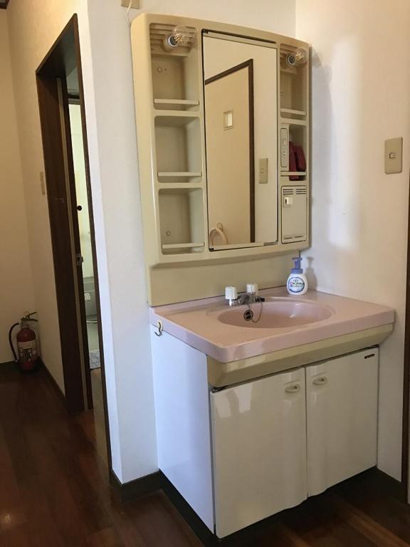 Golden Mile Apartment Amami Luaran gambar