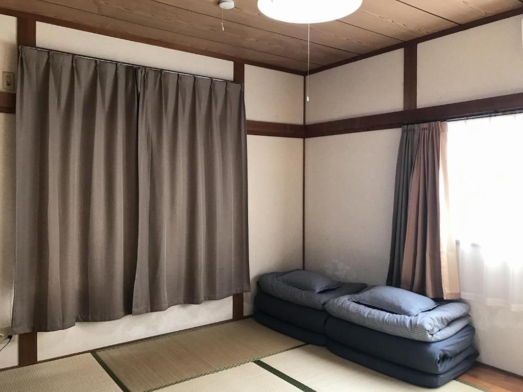 Golden Mile Apartment Amami Luaran gambar