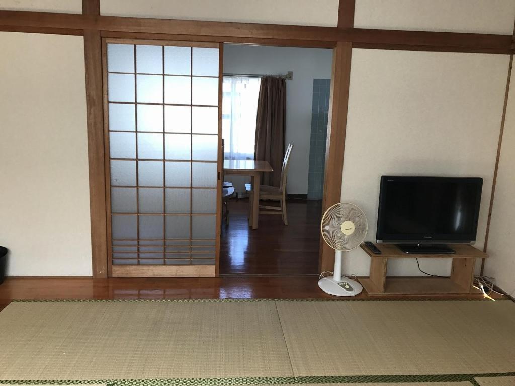 Golden Mile Apartment Amami Luaran gambar