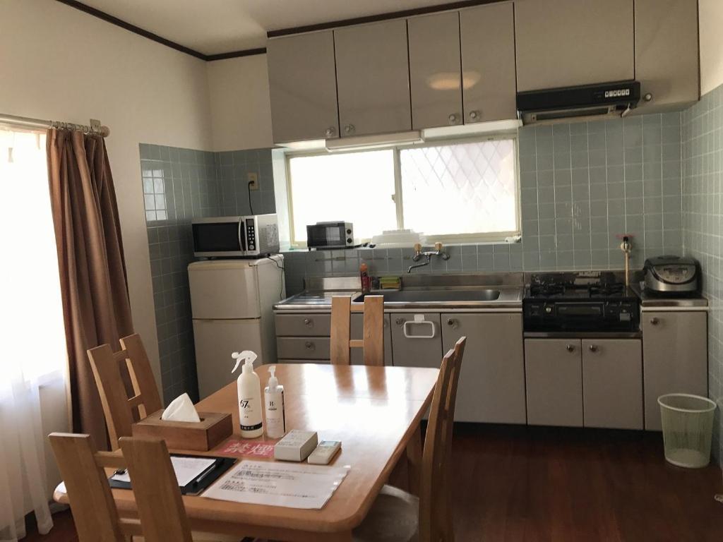 Golden Mile Apartment Amami Luaran gambar