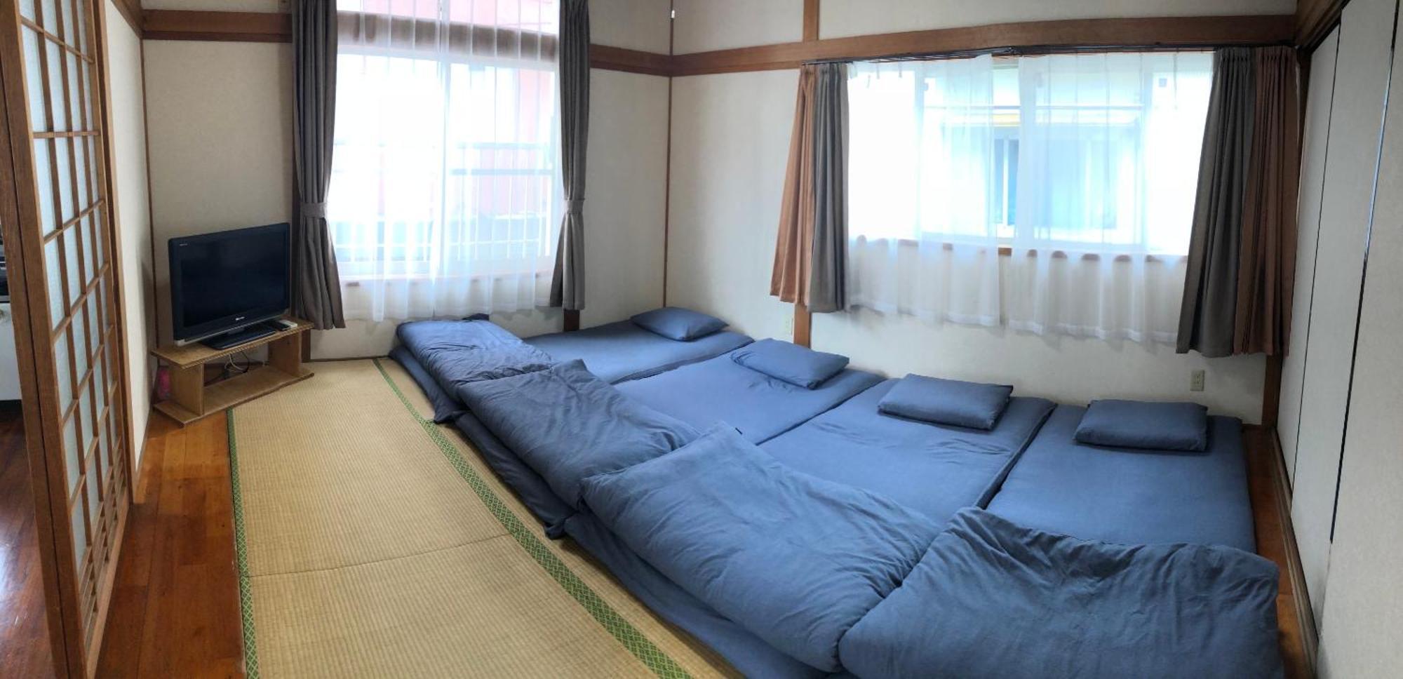 Golden Mile Apartment Amami Luaran gambar